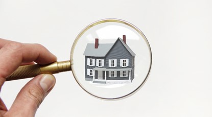 Magnifying glass, house