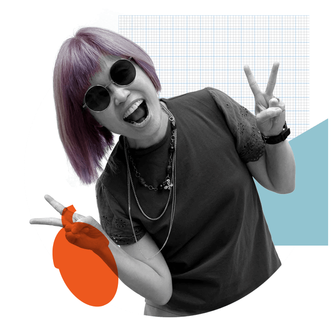 Woman with purple hair smiling, doing peace sign with hands